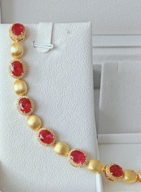 Ruby bracelet with Italian woven gold carving technique