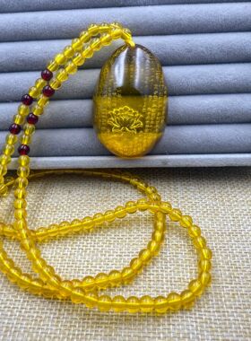 内雕心经千手观音仿金珀琥珀阴雕吊坠项链景区直播货源水滴佛项链