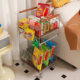 Snack and drink storage rack with movable trolley