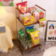 Snack and drink storage rack with movable trolley