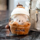 Pendant keychain ຫມີງາມເຊື່ອງໄວ້ໃນ cake