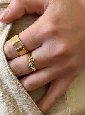 跨境爆款光圈戒圈镶锆石戒指不锈钢镀18K金ins生辰石扭曲尾戒指环