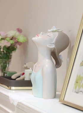 治愈系蝴蝶捧花女孩雕塑艺术清新摆件高级客厅电视柜桌面家居饰品