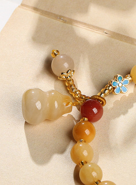 天然新疆黄色金丝玉手