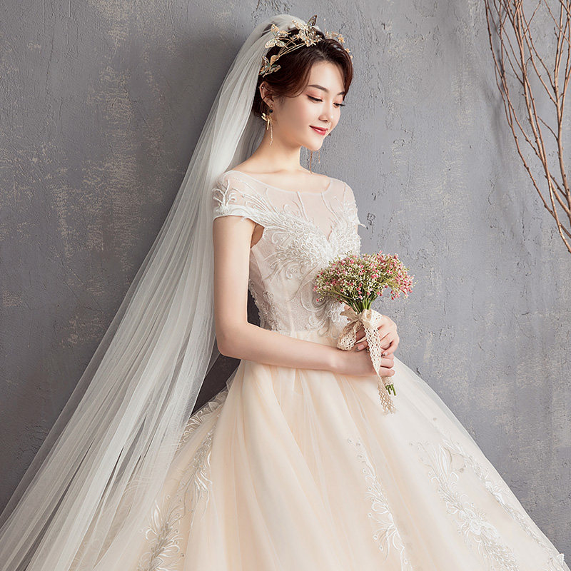 婚纱2019新款显瘦一字肩长拖尾梦幻 曼香侬婚纱