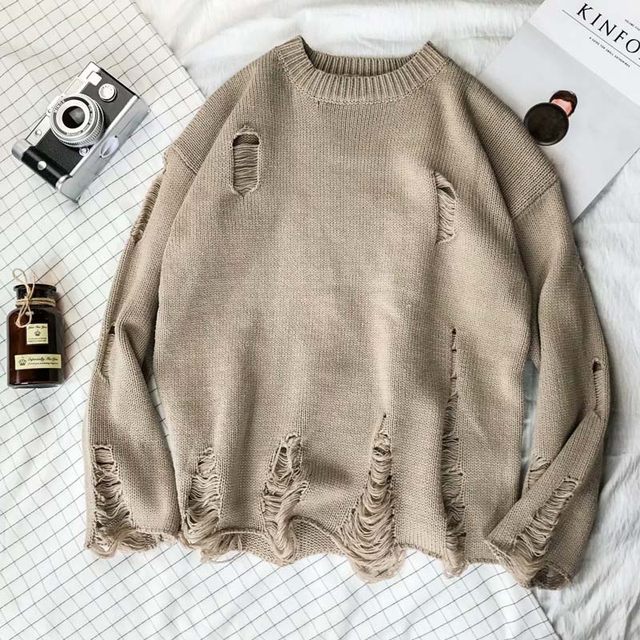 Irregular ripped sweater
