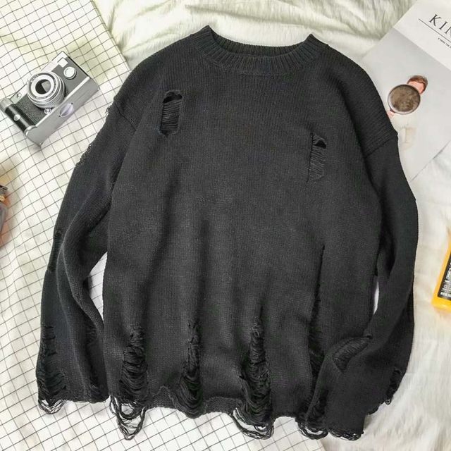 Irregular ripped sweater