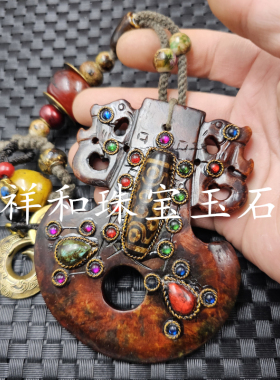 红岫玉战斧玉石手把件九眼天珠