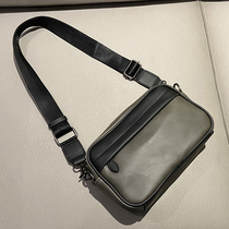 Tide cards new mens single shoulder bag fashion men and women small satchel Han version business genuine leather skew satchel bag mens bag