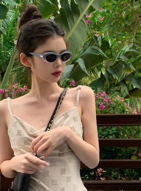 「关於」独家象牙色墨镜2024新款jennie猫眼椭圆形渐变蓝墨镜女gm