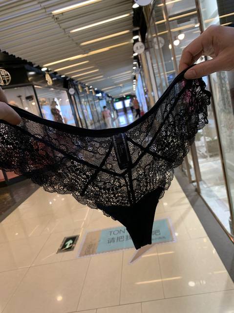 European and American black light pink hollow hot briefs