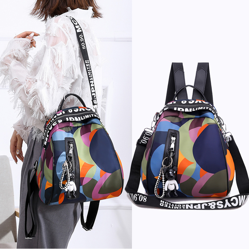米格莱思旗舰店贝壳两用潮流双肩包女韩版花色背包新款牛津布百搭小包包时尚1
