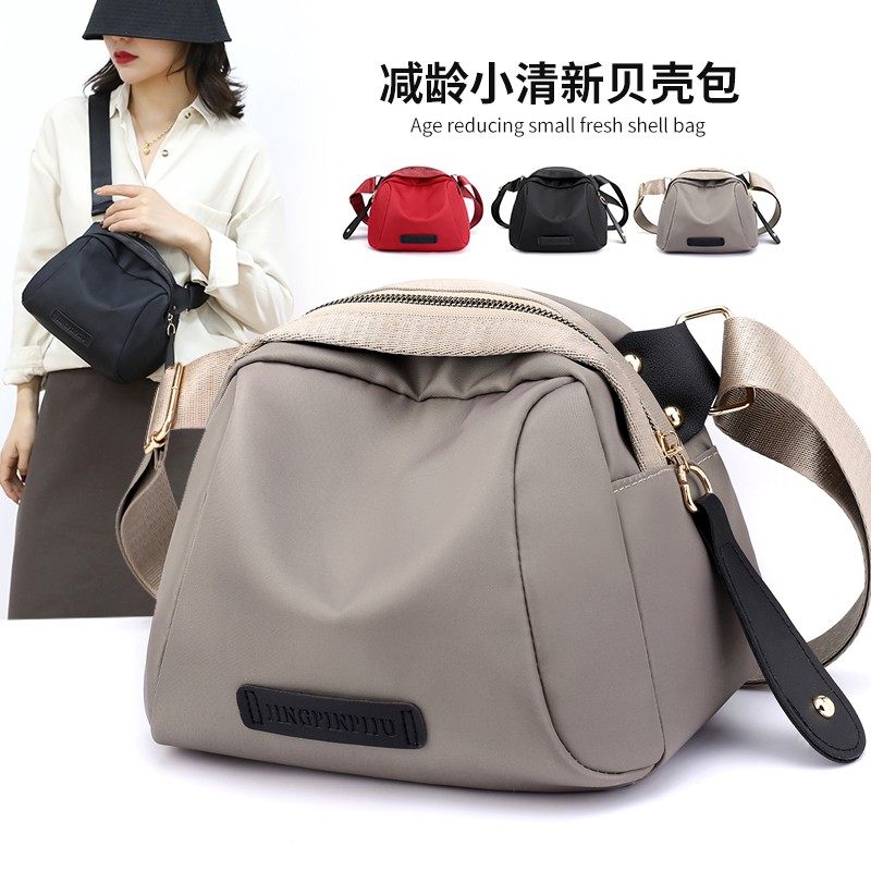 2022新款潮单肩小包包女夏帆布包 米格莱思女士包袋