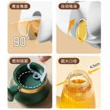 Масляный горшок кухня, предоставляя высокую стеклянную приправу.