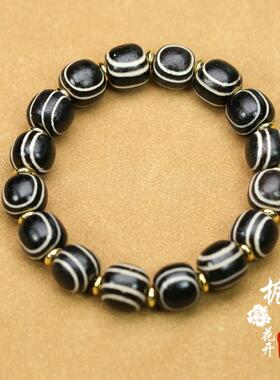 天然藏传缠丝玛瑙黑风眼天珠文玩