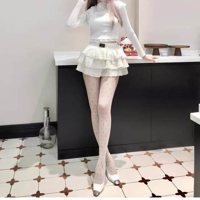 Retro high-waisted skirt double-layered lace spliced ​​fluffy cake skirt autumn new hot girl style design skirt