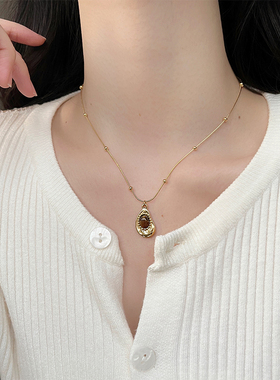 UNBEATEN美拉德虎眼石钛钢项链女2025新款秋冬轻奢小众毛衣链配饰