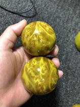 Manufacturer direct sales large leaf gold silk nanwood health care ball activating ball fitness ball handball gold Zhangmu Wen playing handlebar piece