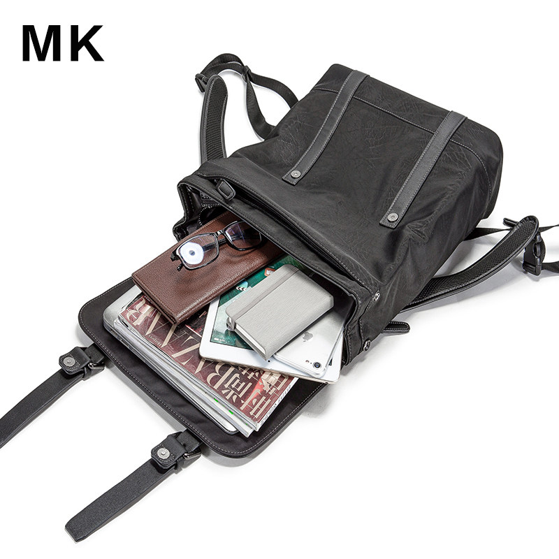 mk男士休闲真皮大容量大学生旅行包 partyplus双肩背包