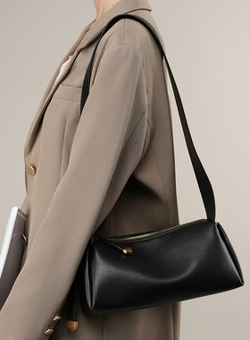 法国设计师CanaryKiss牛皮黑色包包新款真皮斜挎包女高级感法棍腋