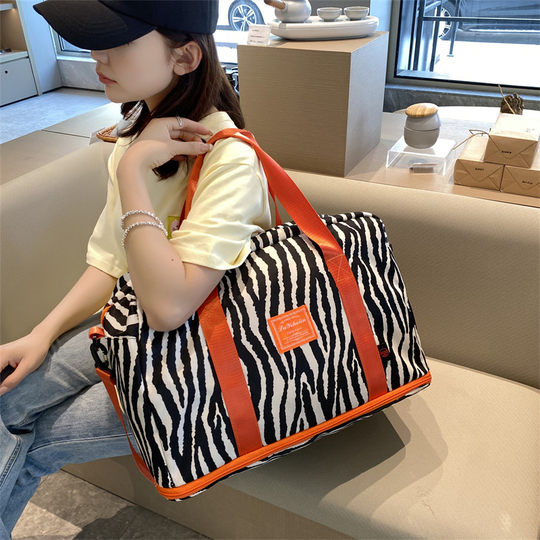 Bolsa de viaje colorida de gran capacidad que se puede utilizar como maleta con ruedas