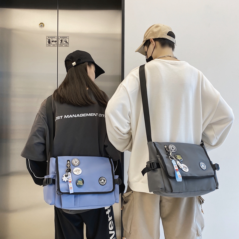 机能男休闲潮牌学生大容量女斜挎包 尼麦男士包袋