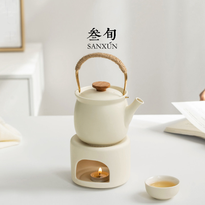 Thirty-year-old small porcelain teapot with raised beams