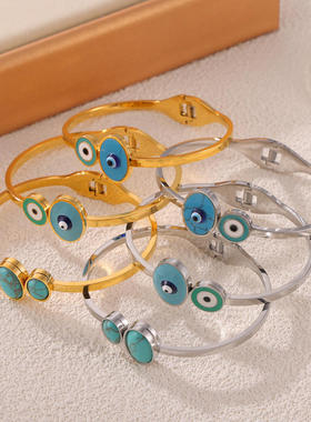 新款创意蓝色眼睛图案大小圆形镀金弹簧手镯恶魔之眼钛钢高端饰品