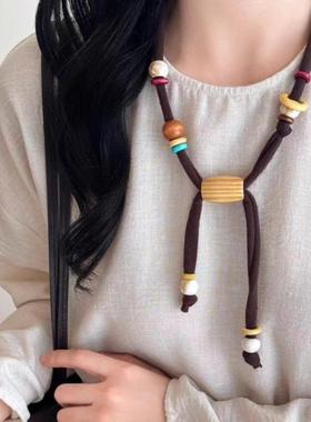 美拉德咖色木质串珠丝巾项链女2025新款复古腰果花毛衣链个性配饰