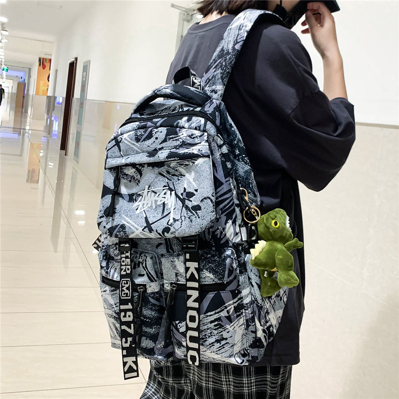 男大学生大容量高中初中生女双肩包 梦凡客双肩背包