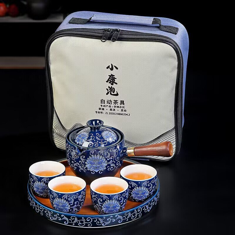 Portable travel tea set complete set of ceramic kung fu automatic rotating one pot four cups side handle tea maker