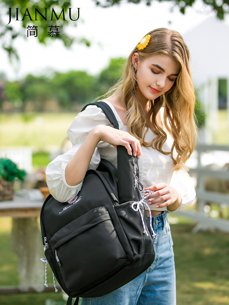 尼龙防水时尚大学生女小雏菊女包 简慕箱包双肩背包