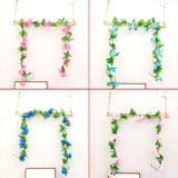 Симуляция розовая фальшивая виноградная лоза Пластическая виноградная лоза, обернутая вокруг воздушных кондиционеров в гостиной, чтобы покрыть декоративные виноградные зеленые растения