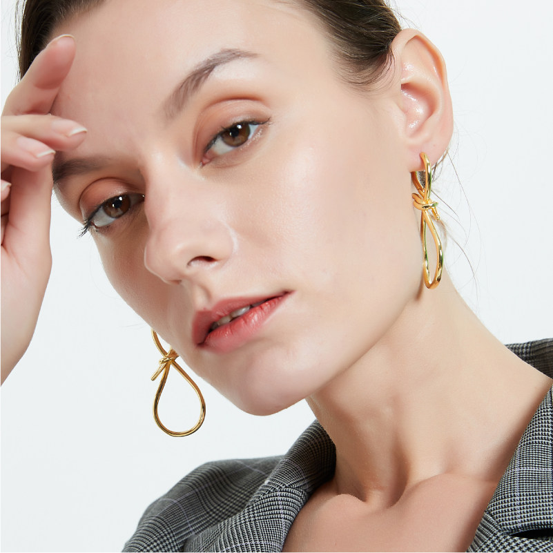 奥米迪奥新款蝴蝶结黄金色网红耳环 aomidior耳环