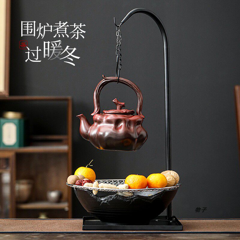 Ceramic teapot for making tea around the stove