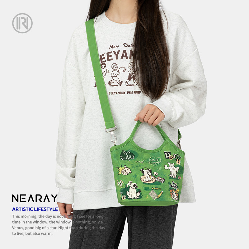 尼睿新款绿色斜挎包小巧便携手提包可爱小狗帆布包拉链手机包Q205,淘宝优惠券,粉丝福利购,淘宝优惠卷