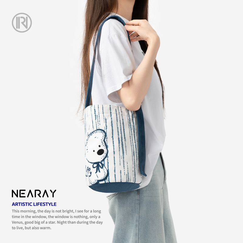 尼睿新款原创清新小狗水桶包可爱休闲简约百搭斜挎帆布包包女AC - 图2