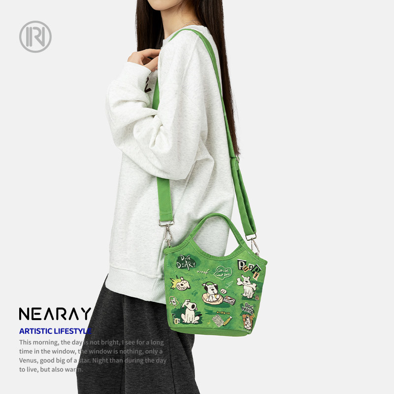 尼睿新款绿色斜挎包小巧便携手提包可爱小狗帆布包拉链手机包Q205,淘宝优惠券,粉丝福利购,淘宝优惠卷