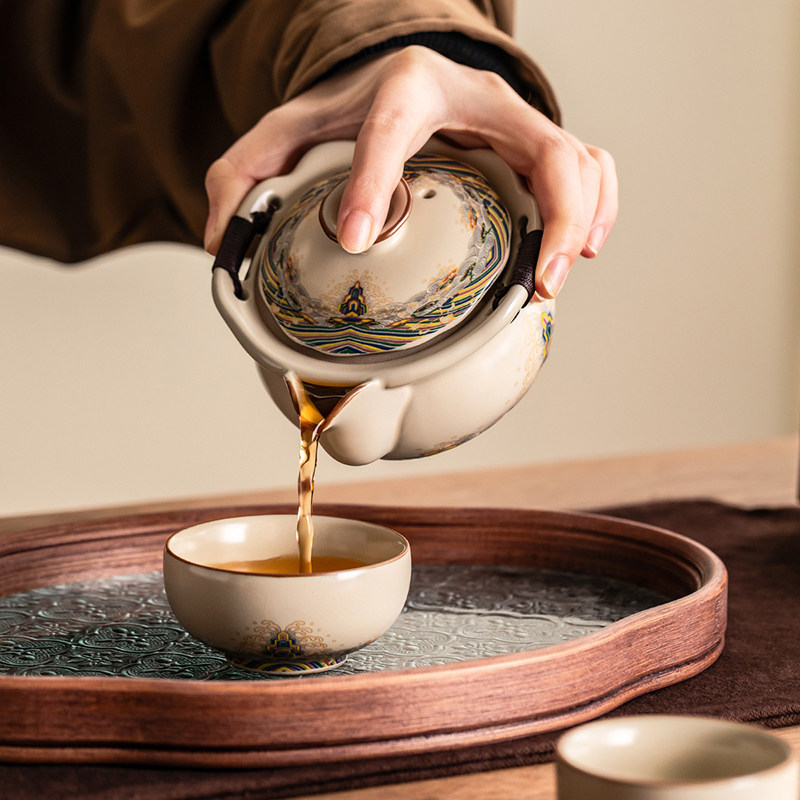 Travel tea set portable hand-held ceramic teapot Kung Fu tea cup outdoor camping tea drinking 2026 new style