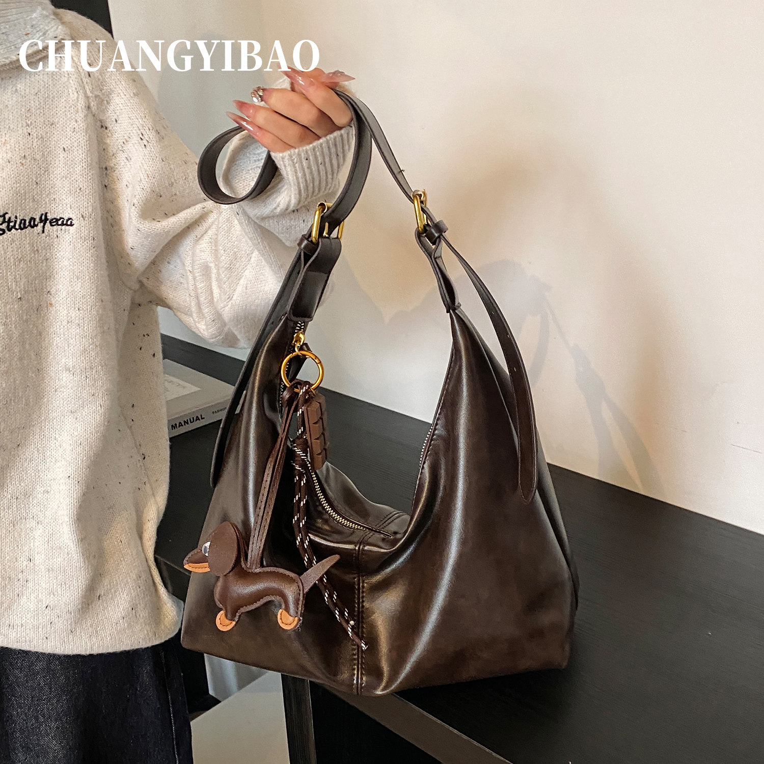 超火麂皮绒手提凯莉包包女式2025新款轻奢小众高级感迷你小斜挎包,淘宝优惠券,粉丝福利购,淘宝优惠卷