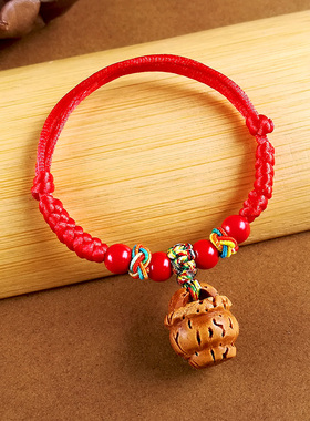 新生婴儿桃核宝宝黑狗牙手链