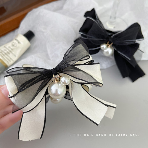 蝴蝶结丸子头抓夹秋冬气质头饰后脑勺盘发神器发卡高级感马尾发夹 - 图1