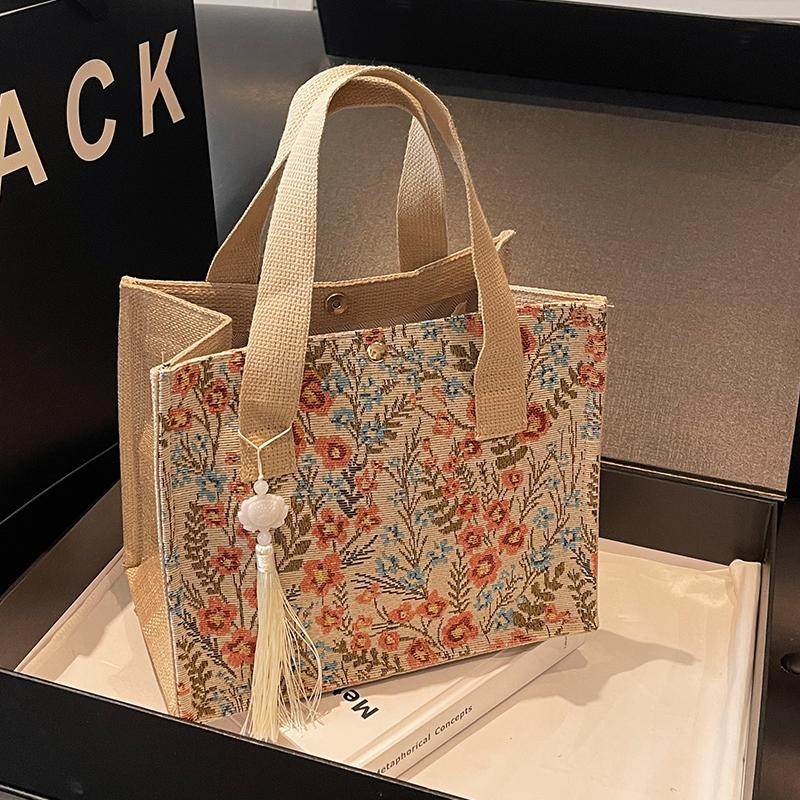 今年流行包包女2025新款麻布手提袋女ins上课通勤百搭碎花托特包,淘宝优惠券,粉丝福利购,淘宝优惠卷