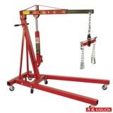 Кран -двигатель на полке на полке автомобильного двигателя ремонт грузовой ассистент кран, чтобы забрать полки