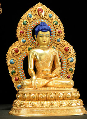 藏式鎏金释迦牟尼铜器摆件带背光