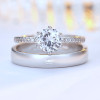 Simulated wedding rings and live props couple