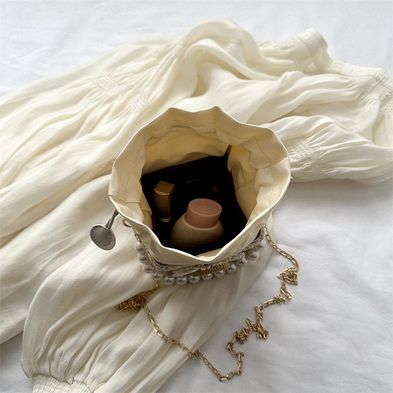 网红草编珍珠链条单肩斜挎包流行小包手提包女2023新款沙滩水桶包,淘宝优惠券,粉丝福利购,淘宝优惠卷