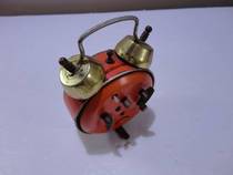 Old alarm clock shop windows swing old drill stones and set up for use