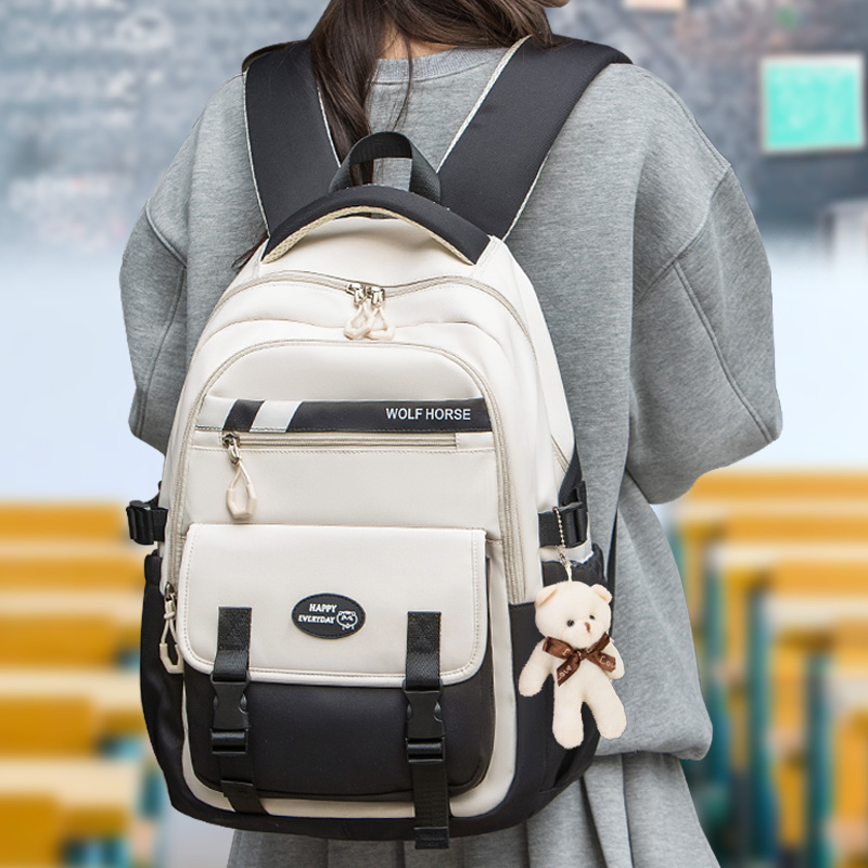 小学生书包女生潮减负轻便中学生初中生超大容量高中生双肩背包男