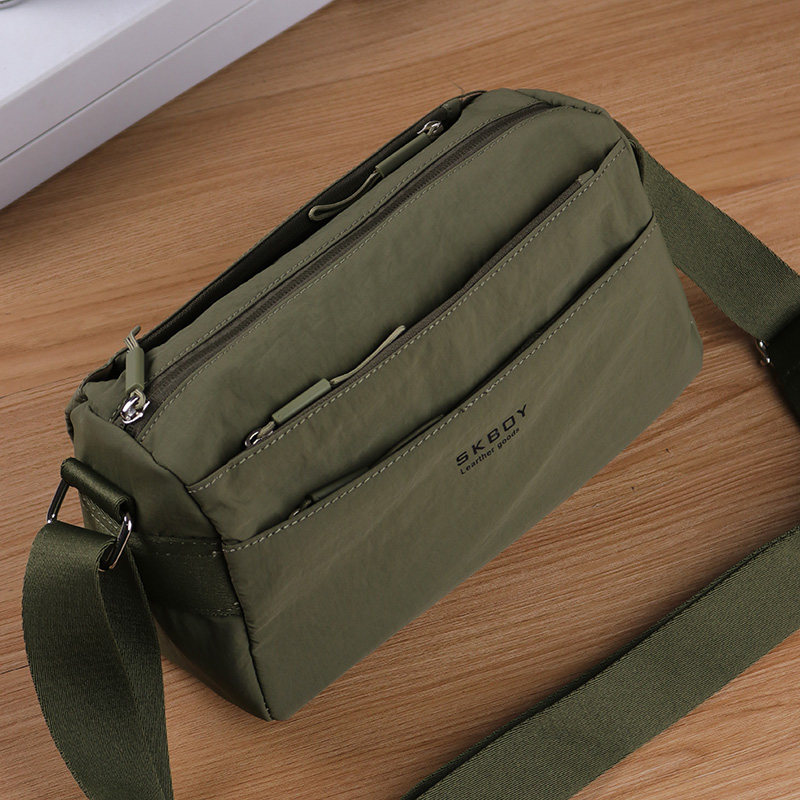 男士斜挎包休闲牛津布小包2025新款大容量单肩包男款高级感便携包,淘宝优惠券,粉丝福利购,淘宝优惠卷